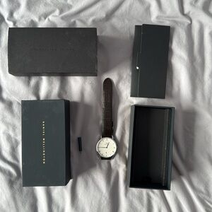 Daniel Wellington Watch with blue hands and generic dark brown wristband